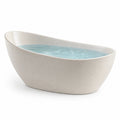 Baignoire îlot en composite minéral blanc cassé, forme organique contemporaine, 170 x 80 x 60 cm